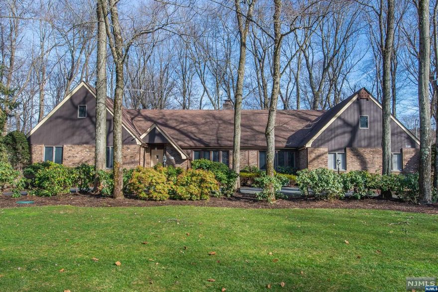 Welcome to this immaculate ranch home in Franklin Lakes, featuring 4 bedrooms, 3 baths, formal sunken living room, formal dining room, and an inviting eat-in kitchen. The spacious family room boasts a coffered ceiling, large windows that fill the space with natural light, and a charming dual-sided fireplace, creating a cozy atmosphere.The kitchen is equipped with state-of-the-art appliances, beautiful tilework, and a center island with a breakfast bar. Updates include a newer septic system and generator, ensuring convenience and peace of mind. With a 2-car garage, a back patio featuring a built-in gas BBQ, and a new fence, this home offers both functionality and outdoor enjoyment.Conveniently located near Market Basket, Starbucks, restaurants, and highways, this property provides easy access to amenities and transportation. Don't miss the opportunity to make this stunning ranch home your own!