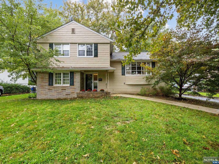 YOUR SEARCH ENDS HERE! Discover the perfect OASIS in this 3-bedroom, 2.5-bath split-level home located on a cul-de-sac! On the main level, a kitchen flows seamlessly into a dining room and living room. Upstairs, you'll find three spacious bedrooms and two full baths. The lower level features a ground-level living room, den, and a convenient half bathroom. 2 car garage and plenty of parking spaces. The backyard is spacious and ready for all your entertainment needs. With a well-designed layout and plenty of space for everyone, this home offers comfort and versatility. The heating and Cooling system is approximately 5 years old. New Providence offers a manageable commute to New City with two NJ transit train stations located within the town. The town BOAsts multiple parks and hiking trails nearby in the Watchung Reservation. Nearby coffee shops, restaurants, and market. Don't miss out on this opportunity to make it yours!