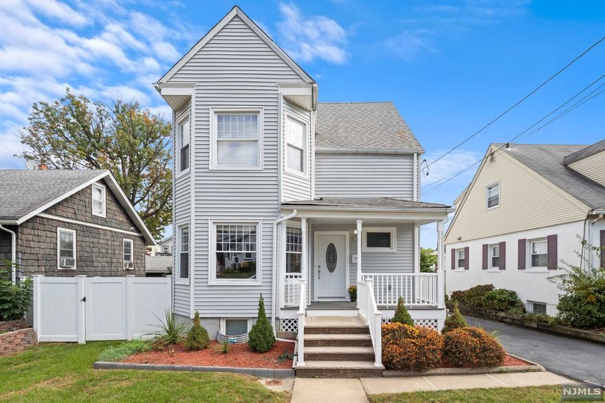 Modern, open and completely renovated! Stunning and completely open first floor with large living room, formal dining area, open kitchen with center island, stainless steel appl/granite counters. Custom millwork and open staircase, large windows for lots of natural light, architectural columns, and hardwood floors are the finishing touches for this fabulous open living space! Three bedrooms and two bathrooms on second floor include a master bedroom with walk in closet and master bathroom/double vanity/glass enclosure shower. Finished third floor is the ideal office/guest rm. All newer plumbing, electric, sheetrock, hardwood flooring, two-zone central air, clean basement with new concrete floor and epoxy paint is ready to finish, tasteful finishes. Super convenient location in Fairmount area is one block to express NYC bus, close to NJ transit trains, shopping, highways, and more! This will not last!