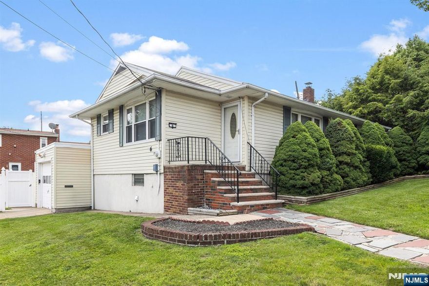 Call/Text Michael 201-240-8422 for private showing. Welcome to this adorable, perfectly priced 3 bedroom, 1.5 bath on the north end of town within walking distance of NYC bus stop, parks and grammar school. Featuring a spacious living room, a dedicated dining area, and a well-appointed kitchen, this home is perfect for both relaxing and entertaining. Enjoy the full basementâ€”ideal for storage, a home gym, or future expansion. The private backyard is perfect for gardening, play, or summer barbecues. A must-see for anyone looking for a cozy, move-in ready home! With Great City Views!