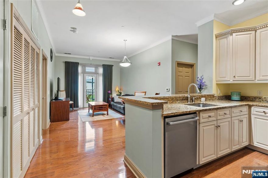 Welcome home to this 2 beds 2 bath waterfront building located at Hudson Pointe. This spacious 1,075 sq. ft. home offers an open floor plan with 2 bedrooms, 2 bathrooms, and a private walk-out balcony. The chefâ€™s kitchen is a standout, featuring sleek stainless-steel appliances, granite countertops, and a stylish glass and marble backsplash. Enjoy the convenience of two car indoor parking (1 assigned & 1 floating) which is very rare! Easy access to NYC with NJ Transit and Ferry Shuttle bus located right across the street, you don't want to miss this one!!