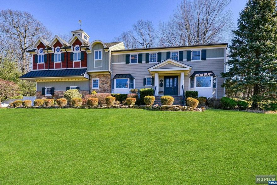 Welcome to 19 Stonewall in the prestigious Riker Hill area. This custom-designed farmhouse sits on over a half acre. The property has been beautifully landscaped and it is one of the most recognizable on the street. Step inside and find a seamless blend of rustic charm with modern touches. Recently renovated is an expansive 5 bedroom, 3.5 bathroom with a finished basement. The first floor features a large living rm, formal dining rm, library rm with fireplace, renovated gourmet kitchen and a fully equipped laundry room. The new kitchen is a culinary haven with 3 Wolf ovens, SubZero fridge, soft close cabinets, Bianco Superiore Honed Quartzite countertops, breakfast island, pantry, radiant heat flooring and a gorgeous sun filled area with access to the backyard. The generous backyard offers a wrap around deck, built-in fire pit and a grilling area. After walking up the newly installed staircase are the sleeping quarters. The luxurious primary bedroom is a sanctuary featuring...