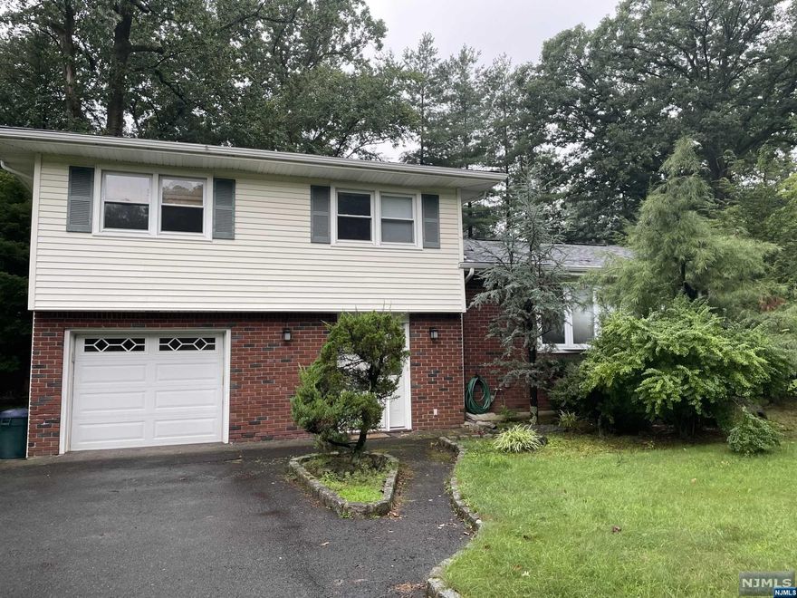 Starter split on nice lot. House needs updating and TLC. Being sold in strictly as-is condition. Any Wash twp Certs required to close are BUYER Responsibility.