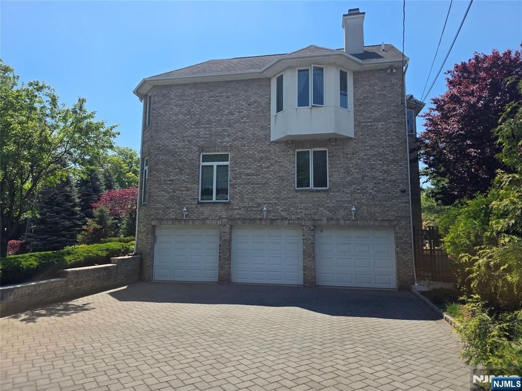 Photo of 1115 Arcadian Way, Fort Lee, NJ 07024 (MLS # 26016367)