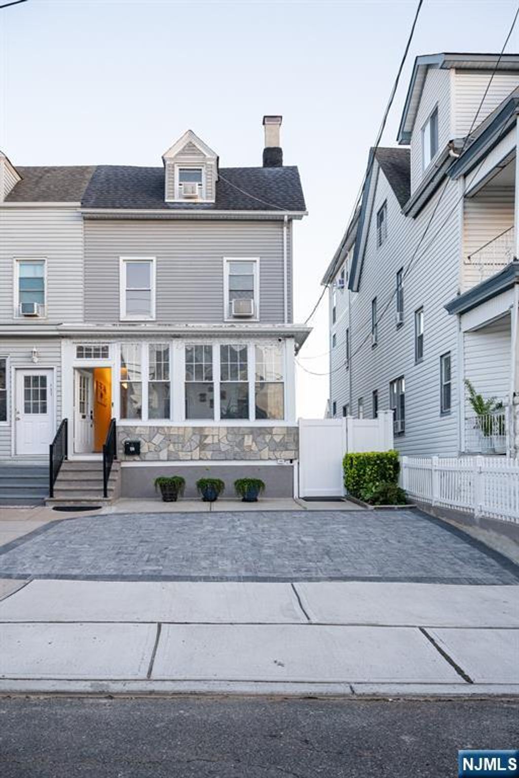 Photo of 139 Autumn Street, Passaic, NJ 07055 (MLS # 25037886)