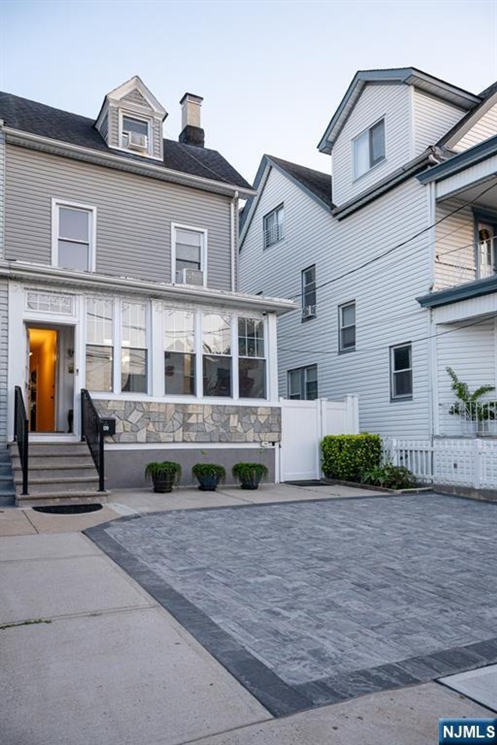 Photo of 139 Autumn Street, Passaic, NJ 07055 (MLS # 25037886)