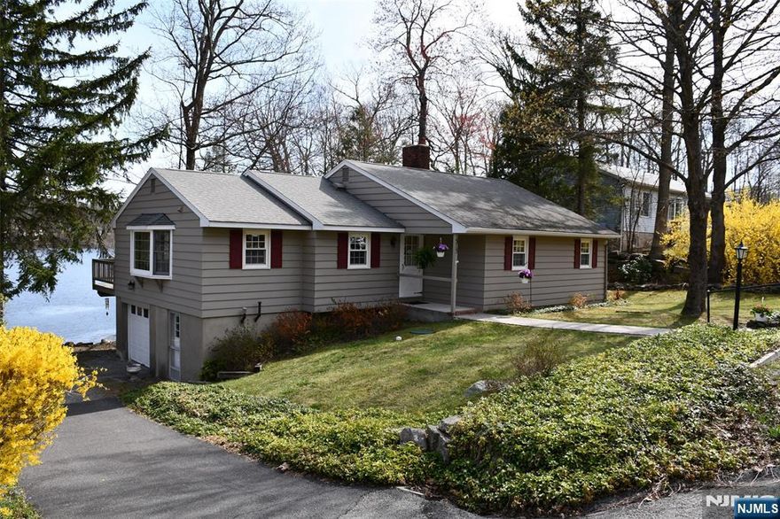 This Beautiful Lake Front Ranch in the desirable Highland Lakes community is being offered for the first time. This lovingly maintained home sits up on the property, offering tranquil views of the lake. Step inside and be greeted by the views which can be enjoyed from almost every room. The bright family room has sliding glass doors leading out to the deck where you can enjoy the warm sun, lake views and summer breezes. Enjoy your meals with a view from the dining room and when relaxing in the living room by the warm fireplace on cool winter days. The full unfinished basement is ready for you to create additional living space. There is enough space for a tandem garage. All you need to do is add the walls and ceiling - the garage door is already there. You can spend your summer days on any of the 5 lakes and 7 beaches. Take advantage of all of the wonderful amenities available as a resident of this community: The clubhouse offers space for large parties, community events, meetings and more. The Main Lake is great for sailing, swimming, boating fishing, events, and amazing views. When visiting the clubhouse, check out the bocce ball court/horse shoe pit, playground, and picnic area. Just up the road at the upper lake you can play tennis, basketball, baseball, swim and make memories to last a lifetime. Step outside this amazing community and enjoy the local restaurants, ski and golf resorts, parks and recreation and more. Room & lot sizes are approximate.