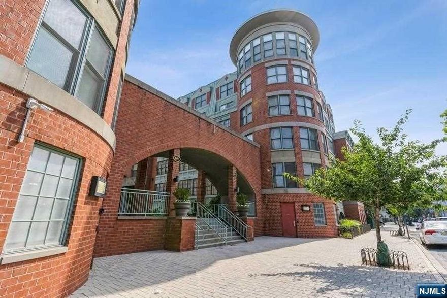 Welcome to the grandiose entertainer's paradise that you have been longing for just minutes from Manhattan! This oversized corner unit at 'The Columbus' in Hoboken is a rare commodity, featuring a highly desirable winged layout, a luxurious private outdoor space with NYC views of the Hudson Yards, and tremendous natural light from unobstructed windows throughout! The expansive living room, formal dining area, stainless steel kitchen, and private terrace are elegantly set off from the sleeping quarters. The exquisite dining area offers the flexibility to be converted into an office or third bedroom. The kitchen boasts copious cabinet space, counter space galore, and a sleek Samsung stainless steel appliance package. The Master Suite includes two closets and an en-suite bathroom with a stall shower. The Second Bedroom features an over sized closet, and is ideally situated opposite a full bathroom with a soaking tub. Hardwood floors, fresh paint, and classic moldings throughout add