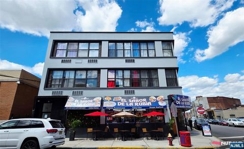 Photo of 30 Howe Ave #305, Passaic, NJ 07055 (MLS # 25029525)