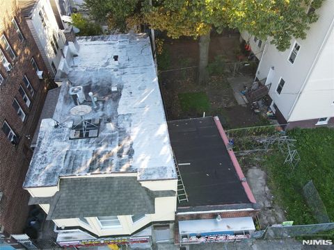 Photo of 97 4th Avenue, East Orange, NJ 07017 (MLS # 25038896) Photo of 97 4th Avenue, East Orange, NJ 07017 (MLS # 25038896)