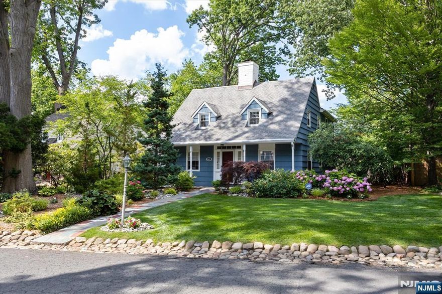 Welcome to this enchanting Dutch Colonial in the famed Fred T. Warner Historic District of Teaneck. This move-in ready gem has been updated & expanded to ensure all that todayâ€™s buyer is looking for. First floor boats Living Room w/fire place, updated kitchen w/maximized storage, Dining Room, powder room, Family room, Bedroom/Home office (w/ access to yard) & easy laundry. House has been expanded w/a MASSIVE Primary suite w/soaring ceilings(11ft) , palladium windows, ensuite w/shower plus an abundance of closet-space. Completing the second floor are two additional good-size bedrooms plus an updated Hall Bath. Semi-finished basement( access to yard), Park-like setting , fully-landscaped yard, paver patios, detached garage w/ 4 car parking pad complete the picture. Upgrades include: newer furnace, Central AC, updated windows, HRWDS, Portable Generator, French Drains/sump pumps & more! Minutes to NYC Buses, Shopping, Parks & Highways-all in a country-like setting. Welcome Home!