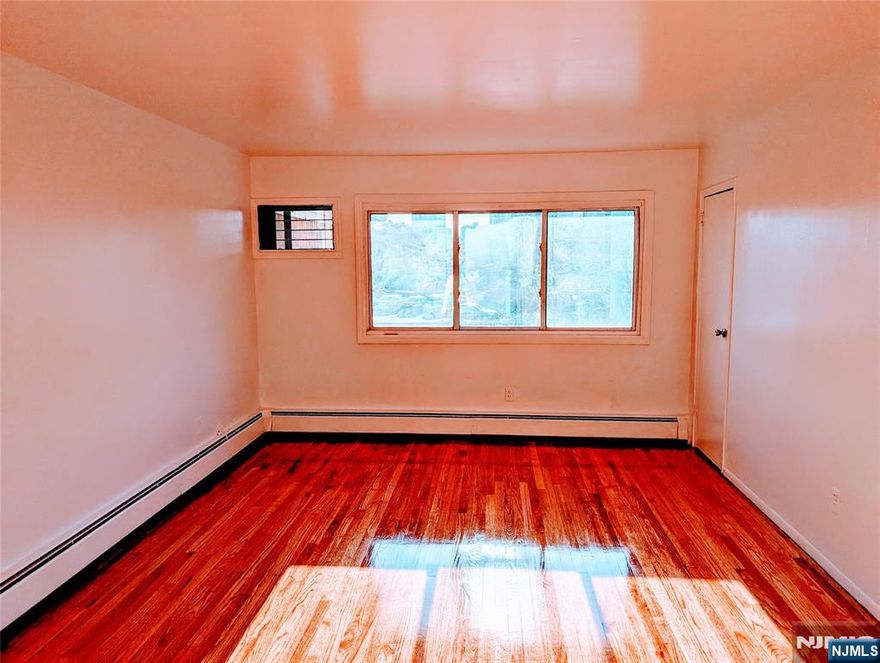 Renovated Studio Apartment. Heat & Hot water included. Hardwood Floors Throughout the Apartment. Plenty of Closets and Amazing Sunlight. - BUILDING FEATURES - On site Laundry On site Parking Minutes to NYC by Car and Public Transportation Right There. Seconds from Shopping Areas Supermarkets. Steps Away from Nearby Kindergarten, Middle and High Schools. Clean & Well Maintained Building by On-Site Super. Great Safe and Diverse Neighborhood. Close to Ridgefield Park, Ridgefield, Teaneck, Bogota & Fort Lee. This is a first floor and parking is included.