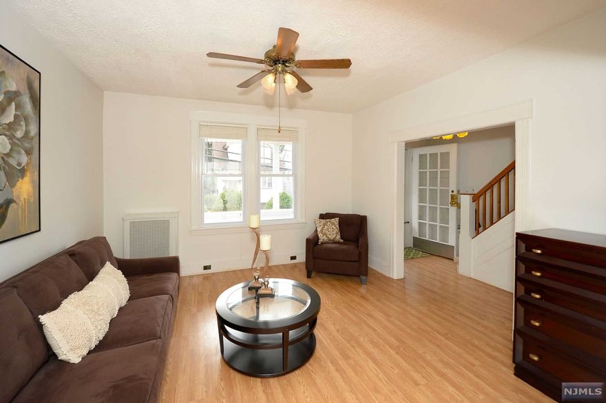 Move in ready, clean and very well maintained single family home, ideal for first time home buyers. Affordable price tag with taxes only 6k a yr! Uptown NB location close to all shopping, NYC transportation and the 167 acre James Braddock Park. This home features a deceptively spacious layout, with living room, formal dining room, and eat in kitchen with perfectly maintained original wood cabinetry, and access to the private yard. Upstairs features two great sized bedrooms, fresh carpeting, and a full bath with new vanity. Basement is partially finished, with a new full bath, and potential for a small family room. Also has walkout access to the backyard. Great starter home at a home run price, this is a no brainer, Call now!