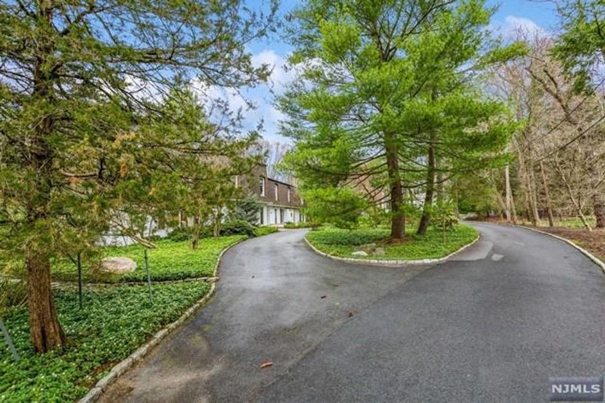 THIS IS AN INCREDIBLE, FIRST TIME OFFERED, OPPORTUNITY IN HIGHLY SOUGHT AFTER DEMAREST. THE 7,418SF HOME IS NESTLED ON A BEAUTIFUL MATURE 2.87 PARKLIKE ACRE ON THE EAST SIDE. IT'S PICTURESQE. THE HOME OFFERS TWO SUITES. THE PRIMARY ON THE SECOND FLOOR AND THE OTHER SUITE ON THE FIRST FLOOR. THERE IS A DOUBLE SIDED FIREPLACE IN THE KITCHEN/FAMILY ROOM AREA PLUS AN ATRIUM. IT BOASTS A FRONT AND BACK STAIRCASE. THE BACK STAIRCASE IS ACCESSIBLE FROM THE LAUNDRY/MUD ROOM. THE UPSTAIRS BONUS ROOM HAS A SKYLIGHT AND IS ADJACENT TO ATTIC STORAGE. ALL THIS PLUS TWO FURNACES ONE FOR THE FIRST FLOOR AND THE OTHER FOR THE SECOND FLOOR. DEMAREST OFFERS A GREAT SCHOOL SYSTEM, A NATURE CENTER AND AN EASY COMMUTE T NYC. THE CITY THAT NEVER SLEEPS.
