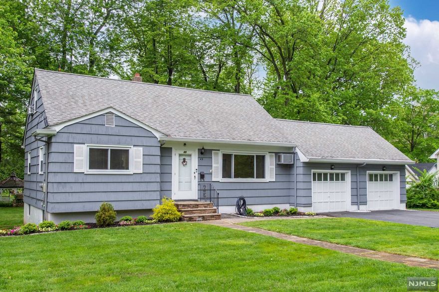 Don't miss this opportunity to be part of an amazing community with top rated schools! This charming cape cod has been tastefully updated and has a prime cul-de-sac location with Memorial Park just at the end of the road! First floor features a sun drenched living room, spacious dining room, kitchen, bedroom & full bath. Convenient breezeway off kitchen leads to 2 car garage. Beautiful hardwood floors throughout! Upstairs you will find 2 more bedrooms and a full bath. Finished bsmt is a fantastic bonus area. Spacious & private park-like backyard w/large deck. This is a prime neighborhood in West Caldwell, conveniently located near schools, parks, the town pools, shopping, dining, major highways & NYC trans.