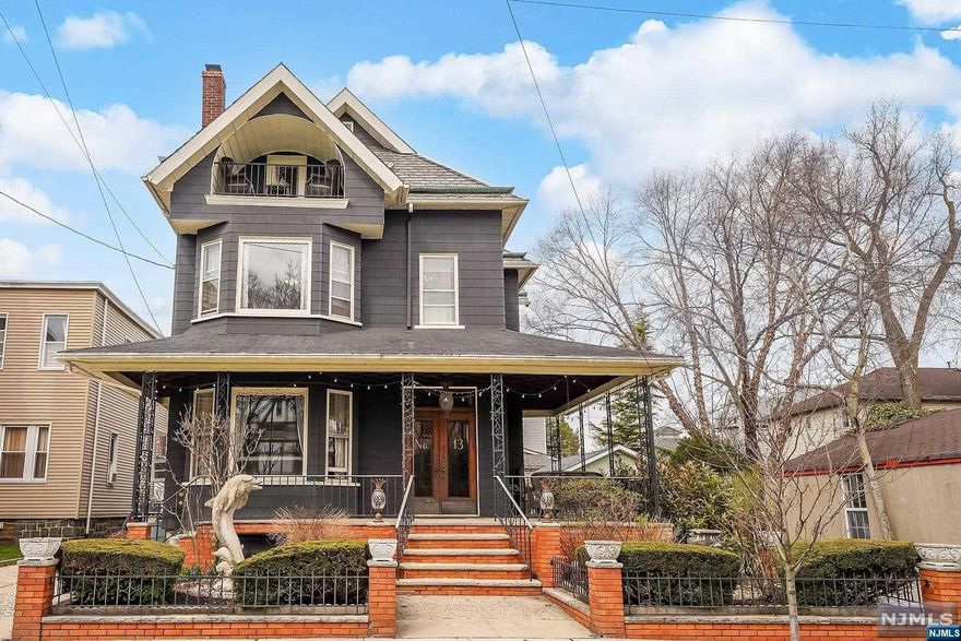This Massive Grand Victorian Sits on a 50 x 100 ft. Lot in King's Bluff! Flanked by 2 Beautiful Vintage Gardens including Heirloom Roses, Coneflowers & Daisies! Framed by an Enchanting Wrap-Around Porch with Pineapple Porch & Garden Lights & Parking for 4 Cars! 13-15 King Avenue is Restored, Renovated & Tastefully Upgraded! Keeping the New Modern Elements Fluid & Aligned with the Original Architecture and Abundance of Historical Detail. With 4 Floors of Living Space & Over 4000 Square Ft, the Essential Quality of this Palatial Property is the Numerous Places to Entertain, Retreat, Work, Meditate, Exercise, Create, Daydream & Think. Numerous Spaces for Experience include a Top Floor Balcony w/Seasonal Views of NY, A Spacious Back Porch, An Expansive Luscious Garden & Substantial Private Patio Surrounded by Flowering Cherry Trees, and Cedar Trellis Fencing. A Finished Garage, Multiple Studios & Work Rooms, and an Opulent Living Room to Sink into a Relaxed State.