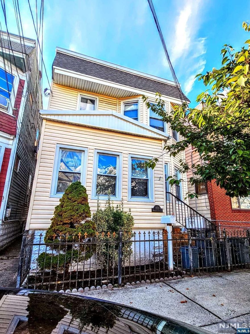 Charming Two-Family Home located in the center of town. Close to schools, shopping and NJ Transit transportation. The home's first and second floors offer a living room, dining room, eat-in-kitchen, 2 bedrooms and a full bathroom (additional bonus room located on second floor only). The basement is full and unfinished with all separate utilities. The rear yard is completely fenced in and further offers a paver patio which is great for entertaining.