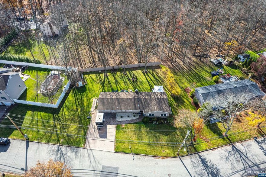 An incredible opportunity to own a traditional ranch in the heart of Northvale. Offering four bedrooms, and two brand new bathrooms. Hardwood floors and a beautiful fireplace in the living room. There's an overly spacious backyard, perfect for entertaining or a private evening. New Roof 2021. Call to make your appointment today!