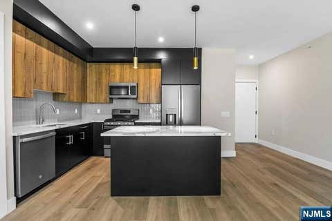 Photo of 2021 Jones Rd #204, Fort Lee, NJ 07024 (MLS # 26026704)