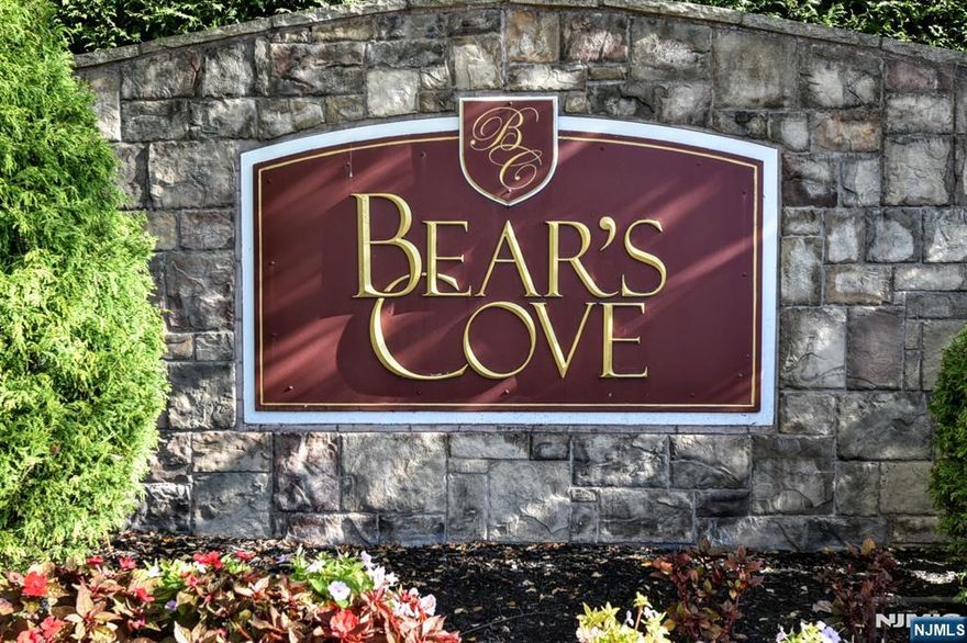 Welcome to one of Bergen County's 55+ Gated Communities! Perfection, spaciousness, style and warmth are the best ways to describe this Apthorpe Model in the wonderful Bears Cove Community! This unit is definitely in the best location....backing up to woods....giving total privacy and peace on the deck. Boasting a first floor Primary Suite with large walk-in closet and luxurious bathroom with stall shower and soaking tub, make this townhome a place you don't want to miss. The spacious second floor has a loft that can serve so many purposes. Two additional bedrooms, each with walk-in closets, give this place tons of storage area. Enjoy the beautiful pool, health club, putting green and clubhouse. There is also an alarm system, glistening hardwood floors, foyer chandelier with lift, private deck, tons of storage, and so much more!!!!