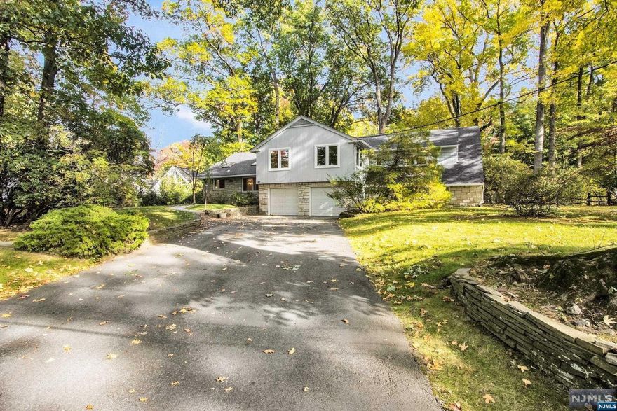 LOCATION! LOCATION! LOCATION! This split-level home is on approximately half an acre on one of the most desirable streets on the East Hill of Englewood. Small cul-de-sac, with a large backyard and easy accesjavascript:laterMLS(document.Mainform, 0);s to EVERYTHING!