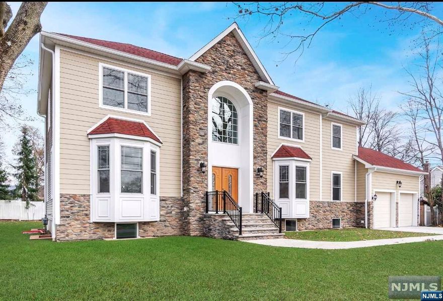 Welcome to the highly sought-after area of Old Tappan. Amazing Blue Ribbon School District is within walking distance from the home, along with Library, Town & Restaurants. Built in 2019, features 5 Bedrooms, 51/2 Baths. Open floor plan with natural light throughout. Hardwood flooring & top-of-the-line appliances. 2 story foyer & staircase., Large modern kitchen Custom wine rack/cooler, Primary Bedroom & Bath w/ Jacuzzi,2 bedroom Junior Suite with a full bath. The lower level offers more living space, with a large family room that is perfect for movie nights or game days. The home is situated on a quiet street, with a large backyard that provides plenty of space for outdoor entertaining and family barbecues. Only 12 miles from New York City. The lower level offers even more living space, with a large family room that is perfect for movie nights/game days. The home is situated on a quiet street, with a large backyard that provides plenty of space for outdoor entertainment.