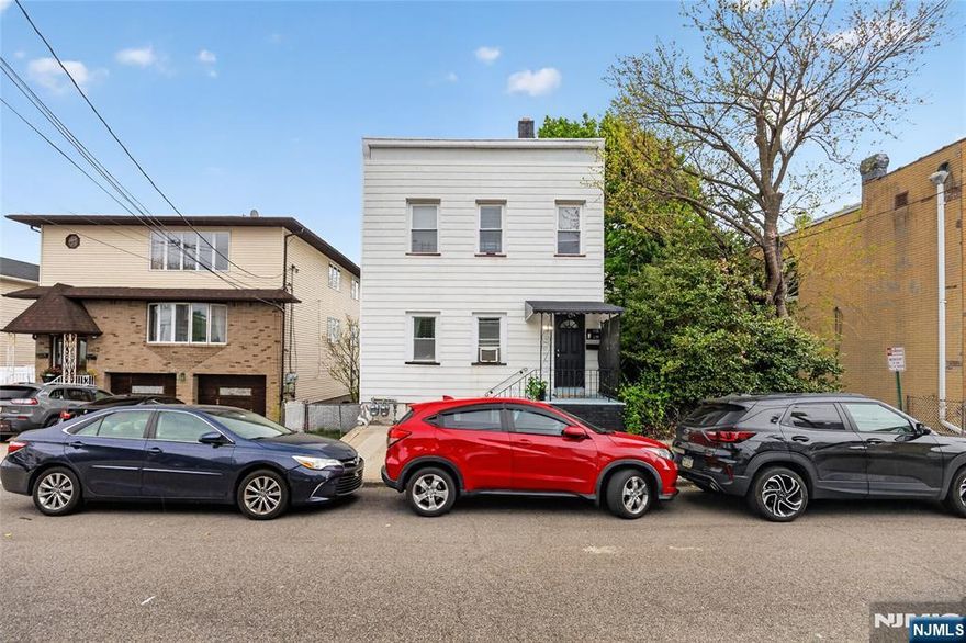 NICE TWO FAMILY HOUSE IN A VERY QUIET NEIGHBORHOOD CLOSE TO TRANSPORTATION NYC CLOSE TO SCHOOLS PARK SHOPPINGS 1ST FLOOR 2BRS, LR, KIT, FULL BATH 2ND FLOORN 3BRS LR, KIT, FULL BATH BASEMENT FINISHED FAMILY ROOM 2 OFFICES ROOM , FULL BATH SEP ENTER BACK YARD SEPARATE UTIL. JUST MOVE IN