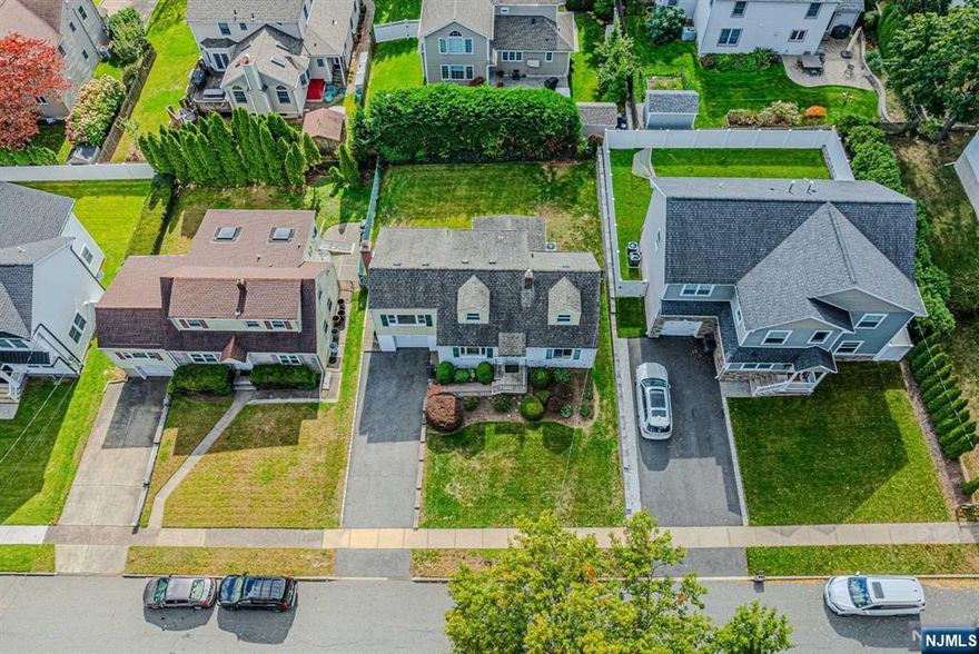 Amazing opportunity on a Sought after Block in RiverEdge. Ideal for an Easy commute by Train to NYC and Close to Shopping, Schools and Houses of Worship. This Charming Cape Cod features 4 Bedrooms and 1 1/2 baths. A Cozy Living Room with Wood Burning Fireplace, A Dining Room and Eat in Kitchen that Leads to an Enclosed 3 Season Porch. As well as 2 Bedrooms and a Full Bath completing the Main Floor.The 2nd Floor has 2 Bedrooms and 1/2 Bath. A Full unfinished Basement with High Ceilings is awaiting your Creativity. Enjoy the Private and Peaceful Backyard Anytime of the Day.