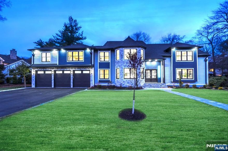 Step into this stunning, Six - Bedroom; Seven and a half Bathroom - Colonial, where modern elegance meets comfort in Ridgewoodâ€™s prestigious Old Country Club Neighborhood. Nestled on more than half an Acre in a serene setting, this home offers a blend of luxury and convenience. Better than new construction, it will take your breath away. Inside boasts a grand foyer, formal living, formal dining, and chefâ€™s kitchen. Immerse yourself in a breathtaking grand family room with windows all throughout and a gas fireplace. Custom designed kitchen with gorgeous cabinets, countertops, center island and top of the line Thermador appliances. Lofty Ceilings and a fabulous open concept with natural light makes it feel like paradise! The six bedrooms are all en-suite, including a huge Primary suite with his/her closets. A balcony offers a relaxing setting to take in the peaceful backyard or stay inside and enjoy the fireplace during those cool evenings. Lower level offers a walk-out Basement with Wine room, en-suite bedroom, Two-full bathrooms, laundry room, and kitchenette / bar which is ideal for family gatherings. This is a fenced and treed-in park-like property. The spacious brand-new deck overlooks the scenic grounds perfect for entertaining. Ultra-large 3-car garage and brand new large private driveway. Close to stores, restaurants & commuter routes, and most importantly in Ridgewood â€“ Top ranked Orchard school district. Welcome Home!