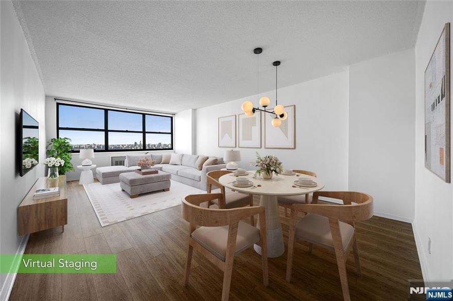 * Presented by Wendy Gamez 917-504-3347 * Live above it all at the premier Galaxy Towers. This bright and sun-filled 1-bedroom, 1-bath residence offers sweeping views through expansive windows that flood the home with natural light. A tastefully renovated kitchen with newer appliances seamlessly blends style and functionality, creating a refined yet comfortable living space. Enjoy effortless access to Manhattan with the Port Imperial Ferry just three minutes away, or a quick bus ride of approximately 15 minutes. Residents enjoy true resort-style living with 24-hour concierge service, indoor and outdoor pools, sauna, fully equipped fitness center with a separate weight room, tennis courts, library, and an exceptional array of on-site conveniences, including a deli, spa, pharmacy, dry cleaner, and shopping mall. The monthly HOA of $954 includes all utilities, hot and cold water, sewer, gas, and electricâ€”as well as full use of the buildingâ€™s amenities. Annual taxes are $6,643.61. Parking is available for $120 per month. Schedule your private tour and elevate your everyday lifestyle.