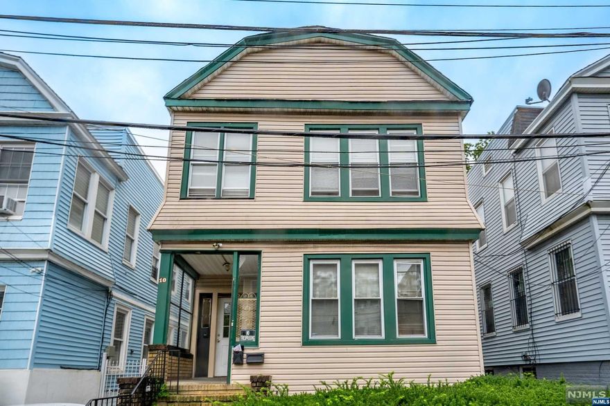 Calling-out investors, four-family house in Newark with its low taxes. Featuring four individual units, each equipped with a full bathroom offering tremendous potential for rental income. Conveniently situated near schools, public transportation and major highways. Car garage available, with few renovations this property could become a lucrative asset for investors.