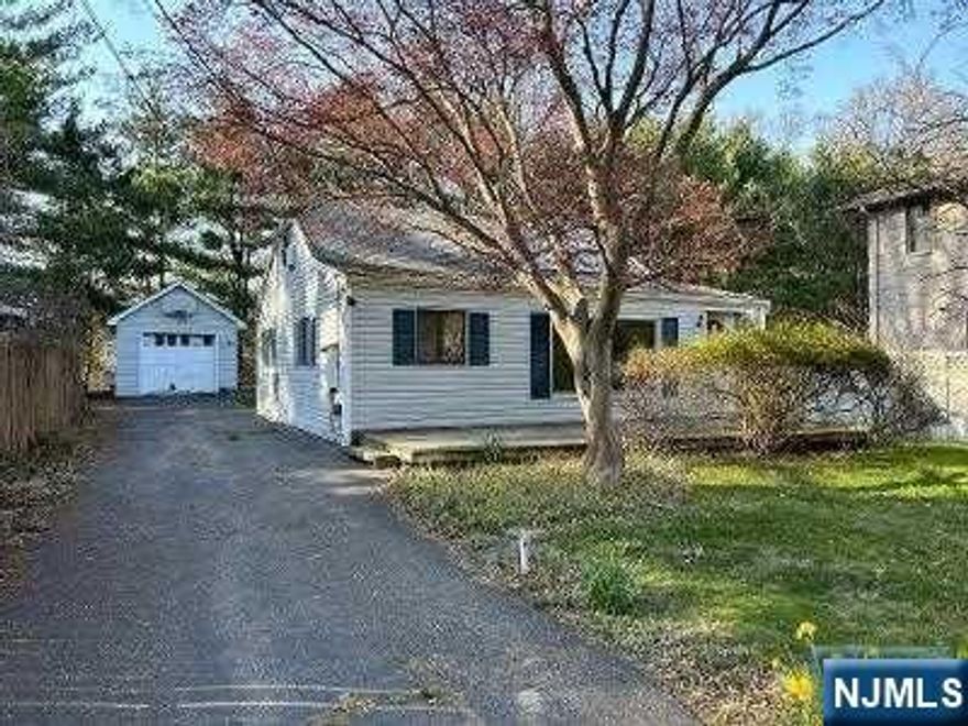 Conveniently located house rental on residential street. Living room, large eat-in-kitchen with stacked clothes washer & dryer, 2 bedrooms and full bath (stall shower). Basement storage. Garage. Private yard.