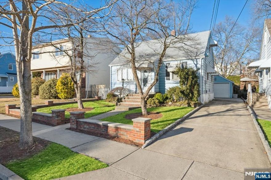 Charming Cape Cod style home located in the heart of Lyndhurst, a highly desirable community known for its convenient NYC access, local parks, shopping, and dining. This home offers 2 bedrooms and 2 full bathrooms and was originally a 3-bedroom, providing flexibility for future reconfiguration. Featuring a true mother-daughter style layout with two kitchens. Enjoy a beautiful, private backyard with mature landscaping that backs directly to the park, offering exceptional privacy and a serene outdoor setting rarely found. Additional highlights include a detached garage and a full basement, providing ample storage and additional potential. Situated in a wonderful neighborhood with easy access to major highways, public transportation, schools, and town amenities.Being sold strictly AS-IS.