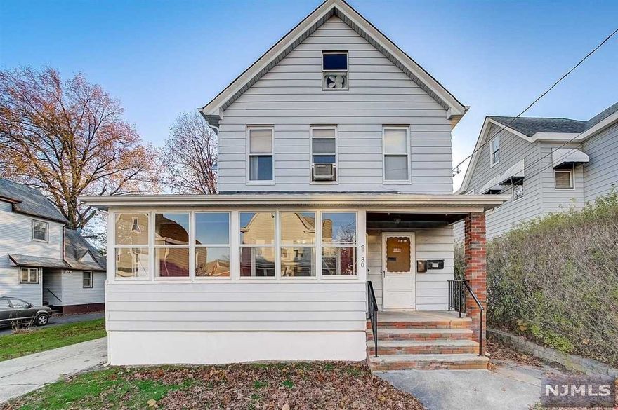 Updated 2-family income-producing property! Great opportunity to either collect rent from both units or live in one while collecting from the other unit. The 1st floor has been freshly painted & offers a generous size living room, EIK with access to side yard, full bath and 2 bedrooms including a master bedroom w/3 closets that leads to the large Deck with wrap-around bench seating. The 2nd unit boasts a remodeled EIK w/new countertops, new wood cabinets, new stove & new flooring, bright living room with large windows, spacious bedroom with walk-in closet and full bath w/new vanity sink. Access from hallway to large unfinished attic has great potential. Stairwell with separate entrance to basement. Features include hardwood floors throughout, 2 electrical panels ('21), HWH ('21), Roof ('18), ceiling fans, large enclosed Porch, grassy area for entertaining, oversized 2 car garage & parking for 5+ cars on long concrete driveway. Close to major highways and NY trans by bus and train.