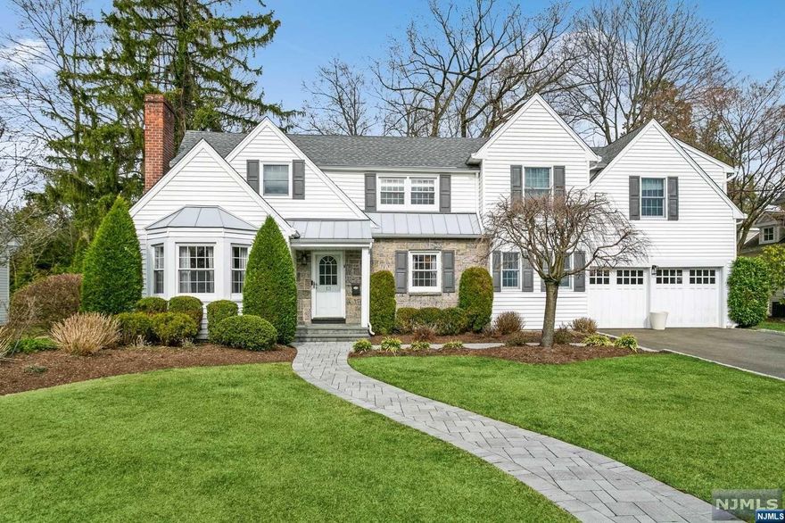 Nestled in the sought-after east side of Tenafly, this exquisitely gut-renovated residence awaits its new owners. Designed by Anna Reduce, the transformation has been profound. The heart of this home is a brand-new, sophisticated kitchen equipped w/ top-tier appliances, set beside a high-ceilinged family room that offers serene views of the meticulously landscaped backyard, complete w/ a wood-burning fireplace. The elegance extends to a formal living room w/ fireplace and formal dining room. Renovated powder room and two car garage finish out the main level of the home. Second floor offers a spacious primary bedroom featuring a large walk in closet and a luxurious ensuite bathroom, three additional bedrooms and two full bathrooms. Finished lower level offers a large rec space, storage and full laundry room w/ built in counter space. Externally, the property has been transformed w/ a new patio, outdoor kitchen, and a privacy-ensuring design, making the backyard a tranquil retreat.