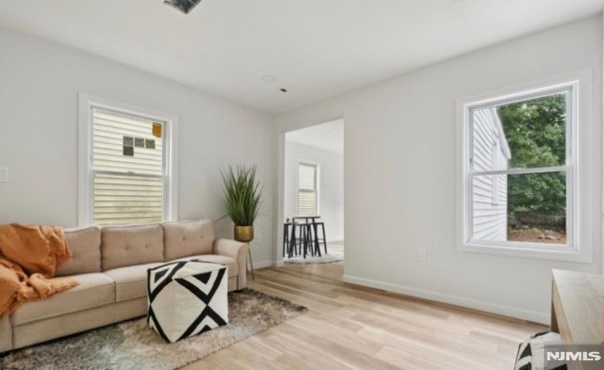 Step inside this fully redesigned charming home at 76 Mitchell Ave. Modernized brand new kitchen with stainless steel appliances & quartz style countertops. Well appointed generously sized first floor bedroom. Enjoy the bright airy freshly painted interior. The residence also features two second floor bedrooms in addition to a newly designed full bathroom. Basement is full & unfinished. The exterior offers enhanced curb appeal. The new crisp siding makes this residence look bright, clean & welcoming. Enjoy leisure in your fenced in backyard. Offering easy direct access to major highways for a commuters convenience.