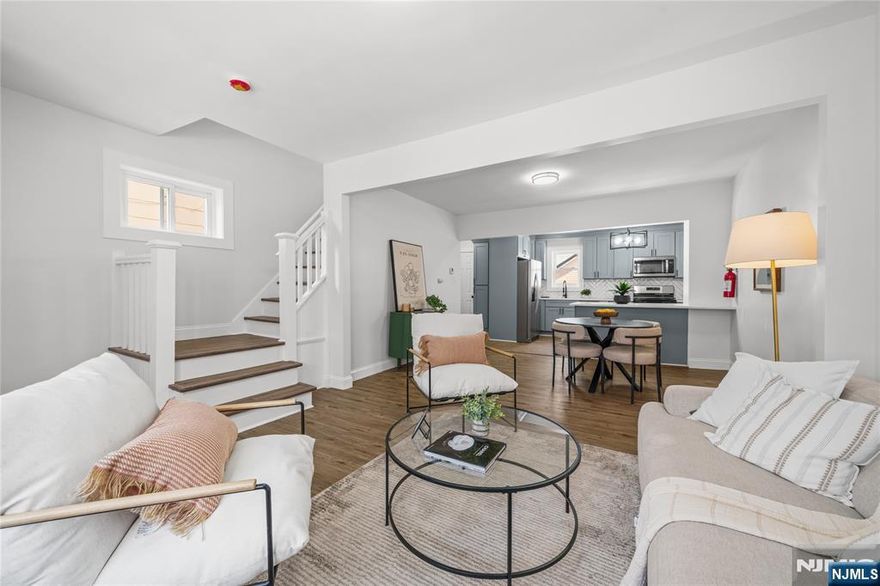 Welcome to 18 Hilton Avenue! Fully renovated from top to bottom, this home offers an ideal opportunity for comfortable, turnkey living in a prime Maplewood location. Step inside and be greeted by a sun-filled open concept that perfectly balances open living with defined spaces. The formal living and dining rooms flow seamlessly into an open kitchen, complete with a seating island ideal for everyday living and entertaining. The second floor features three generous bedrooms and a beautifully updated full bathroom. The third floor adds a versatile bonus room that can be used as a private getaway, home office, or playroom. With brand-new central air and heat, quality craftsmanship throughout, and a convenient location, this home is a fantastic starter home ready to be enjoyed.