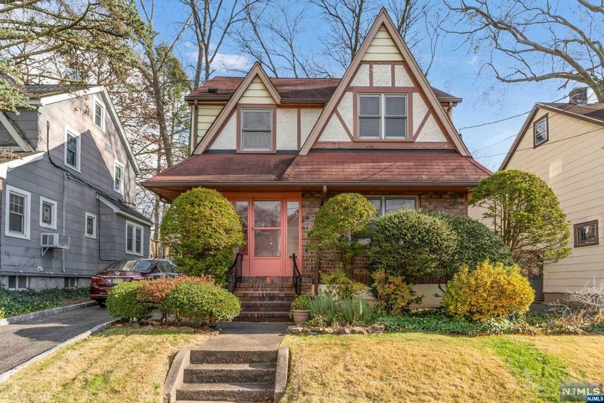 Commuters dream! This 3-bedroom home features first floor den which can serve as primary suite with full bath. Spacious and bright living room, formal dining room, dine in kitchen has two sinks and an office space. Bright and inviting finished attic/third floor that makes the perfect guest room, home office, or playroom. Basement with good ceiling height, laundry facilities and storage. Close to buses, route 4, shopping and houses of worship.