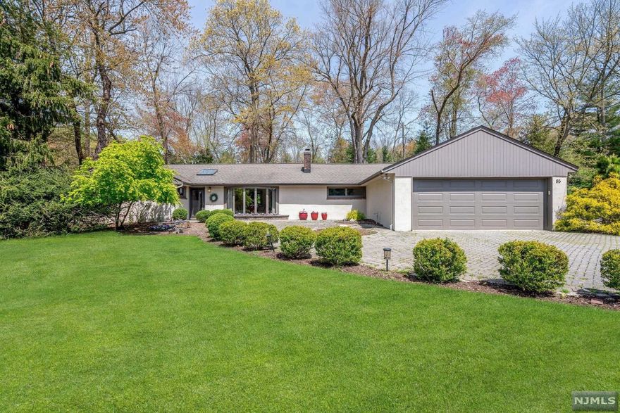 Beautifully appointed sprawling Ranch home in desirable Montvale offers 3 bedrooms and 2.5 baths. Sequestered on serene, park-like lushly landscaped private grounds, this lovingly maintained home is complemented by excellent schools, convenience to shopping, area highways and NYC transit. Distinguished by bright rooms and a relaxed open floor plan, this 2500+ pristine home accommodates grand entertaining and comforatable daily living. Gracious living rm with gas fireplace, modern eat-in kitchen open to sunfilled dining area with large windows overlooking lush private yard with inground heated POOL, 2-tiered deck, firepit, built-in BBQ. FABULOUS expansive yard and grounds! Warm and inviting FamilyRm w/vaulted ceilings, gas Fireplace & custom built-ins. BONUS GreatRm for additional entertaining space w/dry bar & Pella doors to side & rear yard. Corner primary suite w/full spa bath, large WIC and deco windows. 2 addt'l spacious bedrooms & Full hall bath. A wonderful lifestyle awaits!