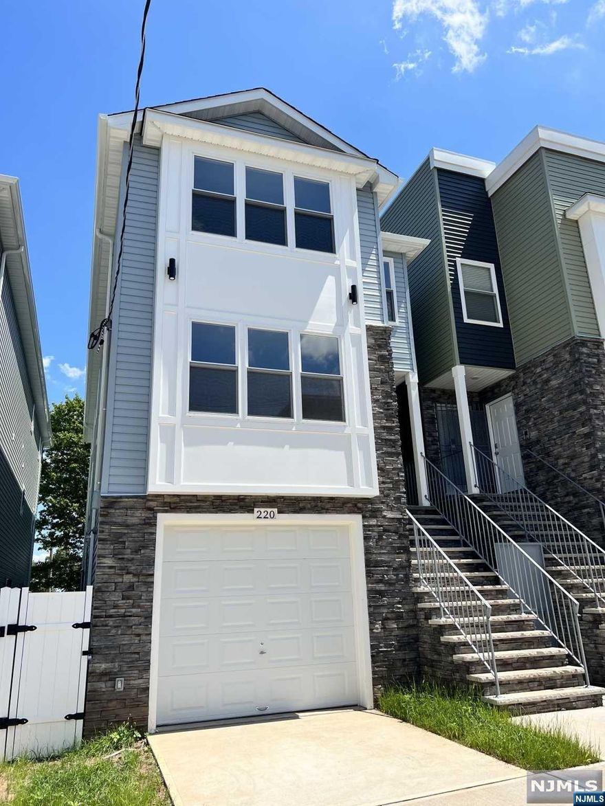 Best brand new construction deal in town! Come check out this gorgeous new construction in brand new foundation which is located on a quiet street and close to all major routes, shopping and many more. This house qualifies for a 5 year tax abatement and 10 year Home owner Warranty, so do not lose this opportunity! The basement is fully finished with a half bathroom, recreation area and a 2 car garage. The first and second floors are identical, featuring hardwood floors throughout, granite counter tops, three bedrooms, including a main bedroom with en-suite bathroom and walk in closets and many more. Come see it today before it is too late!