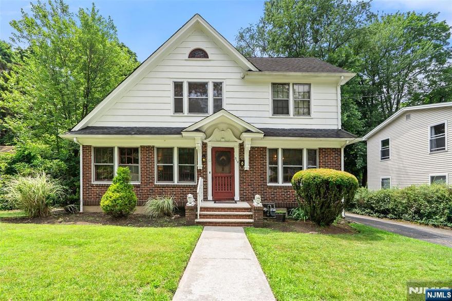 Charming 3-bedroom, 2.5-bathroom home with a finished basement & unfinished attic is located in Englewood on the border of Bergenfield, Teaneck and Tenafly. It features a spacious living room with a cozy fireplace, a den off the living room, and a large dining room. Hardwood flooring runs throughout, adding warmth and character. The home also boasts a half-brick exterior, a two car garage, and is conveniently close to major transportation. Enjoy a private backyard for relaxation and outdoor activities. Perfect for comfortable living and easy access to surrounding towns. Schedule your viewing today!
