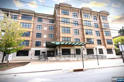 Photo of 54 Polifly Road #409, Hackensack, NJ 07601 (MLS # 26030765)