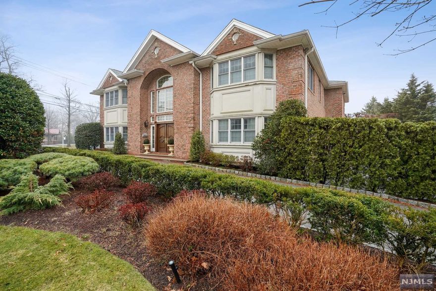 PRIME NORTH CLIFFS LOCATION! MINUTES FROM THE GWB AND NYC! DRAMATIC 2 STORY ENTRY OPENS TO FLR, FDR W/ CUSTOM INLAID FL, EIK, 2 STORY GR RM W/ FPL, AND FABULOUS OUTDOOR VERANDA EXITING TO REAR YARD. FLOODED W/ NATURAL LIGHT. ALSO INCL ENSUITE BED, PR, LAUNDRY. UPSTAIRS OFFERS HUGE MASTER SUITE W/ SITTING AREA, DRESSING AREA, OFFICE AND PRIVATE OUTDOOR VERANDA, ENSUITE BED, 2 MORE BEDS, FULL BATH. HUGE BASEMENT W/ REC RM, OFFICE, GYM, BED, FULL BATH, STORAGE, AND TEMP CONTROL WINE CELLAR. TESLA SOLAR PANELS, GENERAC GENERATOR & EC LOW TAXES! A MUST SEE! OWNER HAS NJ REAL ESTATE LICENSE