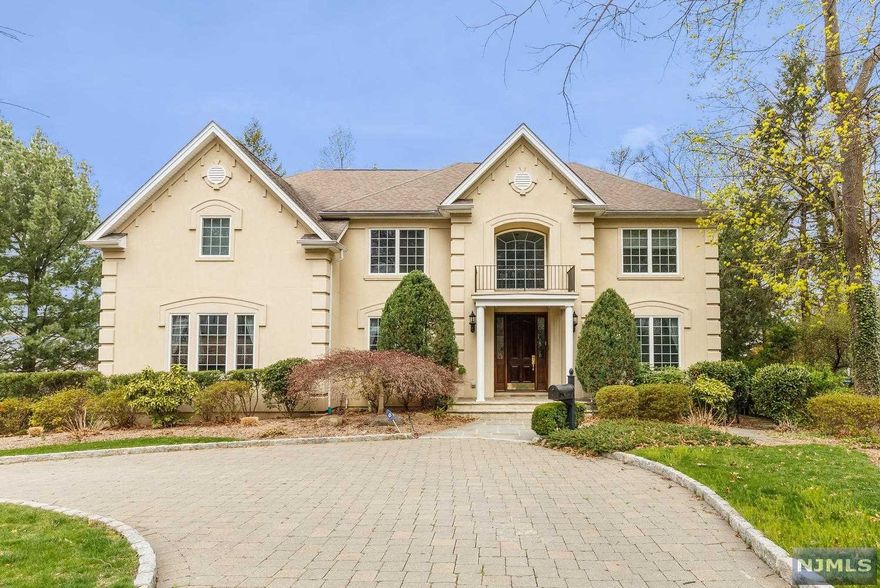 CUSTOM BUILT IN 2003 THIS SEVEN BEDROOM SIX FULL BATH MANOR HOME IS SPECTACULAR LIVING AT ITS FINEST. GRAND DOUBLE HEIGHT ENTRY FOYER LEADS TO ELEGANT LIVING ROOM AND BANQUET SIZED DINING ROOM. CHEF'S GOURMET KITCHEN WITH BREAKFAST ROOM AND SITTING AREA LEADING OUT TO BLUE STONE PATIOS .CONVENIENT LAUNDRY ROOM ON THIS LEVEL. GRAND FAMILY ROOM WITH DOUBLE HEIGHT CEILING AND GAS FIREPLACE. FIRST FLOOR GUEST BEDROOM AND FULL BATHROOM. SECOND FLOOR OFFERS GRAND MASTER SUITE ,JULIETTE BALCONY, SITTING AREA W/I CLOSETS AND SPALIKE MASTER BATH. ADDITIONAL TWO BEDROOMS, JACK AND JILL BATHROOM,PLUS BEDROOM WITH FBTH ENSUITE . THIRD FLOOR WITH GUEST BEDROOM AND FULL BATH ENSUITE PLUS DEN.FINISHED WALKOUT BASEMENT WITH GYM AND RECREATION ROOM PLUS OFFICE AND FULL BATH, THREE CAR ATTACHED GARAGE AND PAVER DRIVEWAY.MAGNIFICENT SETTING WITH GORGEOUS WESTERN VIEWS,MATURE PLANTINGS AND INVISIBLE FENCE . JUST MINUTES TO NEW YORK CITY, SHOPPING, FINEST PRIVATE SCHOOLS AND HOUSES OF WORSHIP.