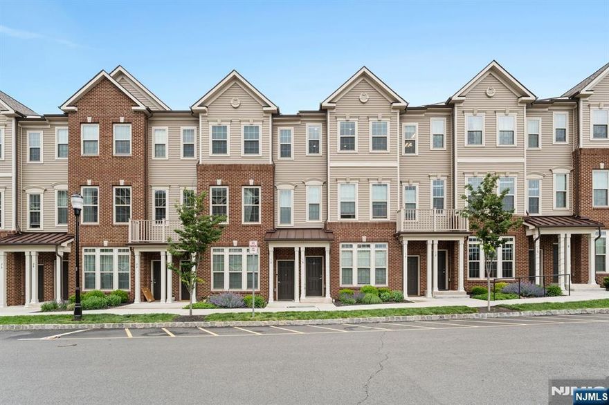 NEWLY IMPROVED PRICE & CHANCE TO CUSTOMIZE YOUR HOME ***Seller is offering $5000 credit for new carpeting OR $5000 credit to add wall for third bedroom OR just towards closing cost, & furniture may be included! Don't miss out on this great opportunity!** Nearly new 2 bedroom (easy 3 bedroom conversion), 2.5 bathroom "Union" model townhome just a few blocks from Somerville Station for an easy NYC commute and a 5-minute walk to vibrant Main Street's dining, shopping & entertainment. Built in 2023, this over 1600 square foot home features elevated finishes including hardwood floors, quartz countertops, an oversized island, floor-to-ceiling kitchen cabinets, and a private balcony. The open-concept layout includes a spacious living/dining area and a versatile loft space perfect for a home office or easily converted to a 3rd bedroom. The stunning primary suite offers a large walk-in closet and en-suite bath. Attached 1-car garage and laundry add convenience. Guardian security system in place. Low HOA fees which include maintenance of common areas, snow removal, landscaping, trash/ recycling & water. Home is part of Somerville's 20-year tax abatement program pay 50% years 1"3, pay 65% years 4"19 offering significant long-term savings. Currently in year 2 reach out to tax office for full details. Estimate is available for new carpet and seller will provide as a credit choose your style and move right in. Nothing to do but unpack and enjoy all that Somerville has to offer!