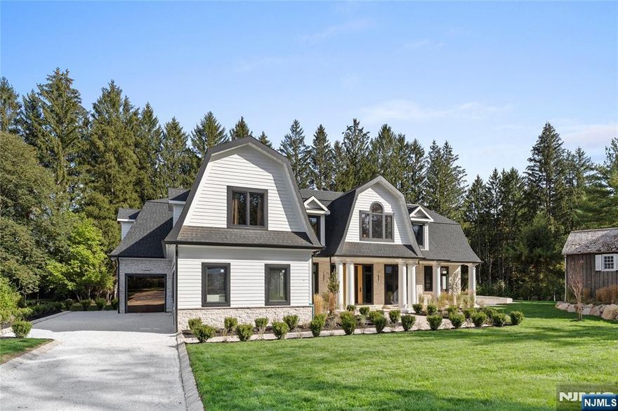 48 Pleasant Avenue, Upper Saddle River, NJ | Where Timeless Design Meets Modern Innovation Set on one of Upper Saddle Riverâ€™s most distinguished streets, 48 Pleasant Avenue is a newly constructed estate that blends architectural sophistication with modern functionality. Built on a new foundation and finished with LP wood siding, this 6-bedroom, 6 full en-suite and 3 half-bath residence showcases refined design across every level. Inside, soaring ceilings and radiant-heated floors define a space that is both luxurious and livable. The main floor features a gourmet kitchen, formal dining area, and a first-floor ensuite bedroom for flexibility. The lower level is designed for recreation and creativity, with an art studio, fitness area, movie room, and family/game room under 10-foot ceilings. A private elevator connects all levels, including a second-floor office and an unfinished attic ready for customization. Every bedroom offers comfort and privacy, while the home is pre-wired for Cat 6 connectivity, security, and smart-home integration. Outdoors, enjoy a resort-style heated saltwater pool, sprinkler system, and expansive patio. A 6-car garage and 15+ car driveway provide ample parking. With multi-zone radiant heat, central air, municipal water, and septic with unlimited capacity for the house and barn, this home delivers performance, luxury, and longevity in Bergen Countyâ€™s premier enclave.