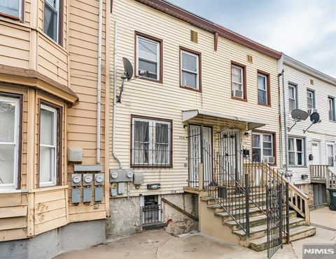 Photo of 121 Highland Avenue, Newark, NJ 07104 (MLS # 25043056)