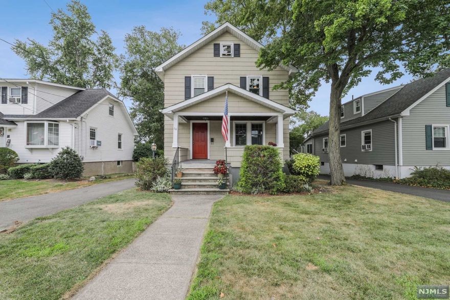 Charm abounds in this well-maintained 3 bedroom, 1 1/2 bath colonial. Enjoy peaceful moments as you enter the wide stairway to the open FRONT PORCH. The first floor features living room with GAS FIREPLACE surrounded by built-in shelving, formal dining room, newer EAT IN KITCHEN with stainless appliances and granite counters and half bath. The second floor offers three bedrooms and light and bright full bath. Spacious, WALK UP ATTIC has great storage space. The basement includes laundry, utilities and additional storage. So many things to love about this home...beautiful wood trim, wood deck off kitchen overlooking fully fenced yard, paver patio, detached garage with electric and much more. Ideally located near transportation, shopping and school. Come see this charmer today!
