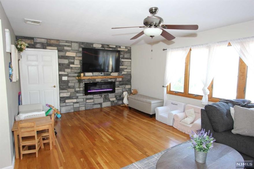 Welcome to this spacious 3-bedroom, 1-bath apartment on the second floor of an owner-occupied two-family home. This unit features an inviting eat-in kitchen with granite countertops and stainless steel appliances, a large living room with an electric fireplace for cozy evenings, and a separate dining room for entertaining. Additional highlights include beautiful hardwood floors, central air conditioning, hot water baseboard heating, in-unit washer/dryer, and the convenience of two off-street parking spaces. With a blend of comfort and modern amenities, this apartment is ready to welcome you home!