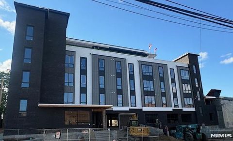 Photo of 50 E 23rd St #407, Paterson, NJ 07514 (MLS # 26008675)